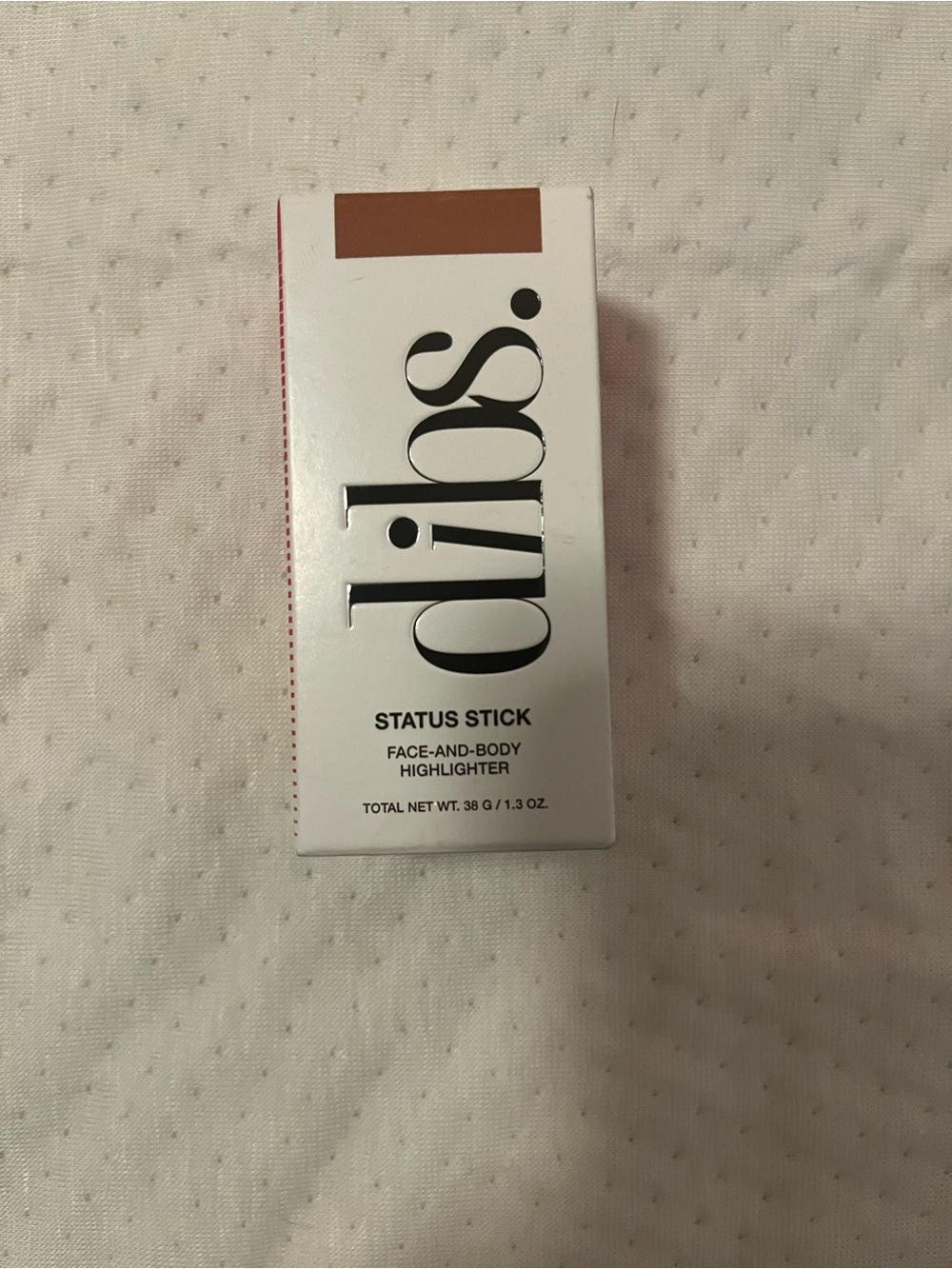 Status Stick Face & Body Highlighter Bronze